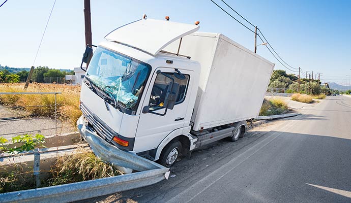 White box truck crashed into guardrail